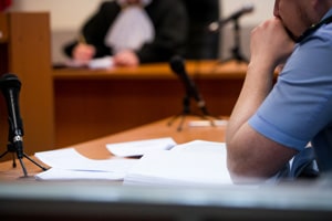 Lawyers listening to the judge in the court room