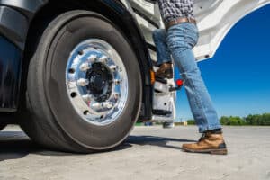 Euro Truck Driver Getting Into Vehicle Cabin